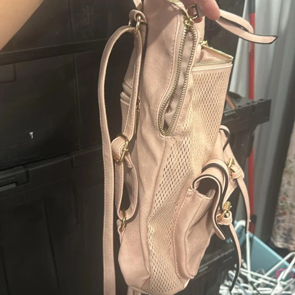 Blush perforated backpack
